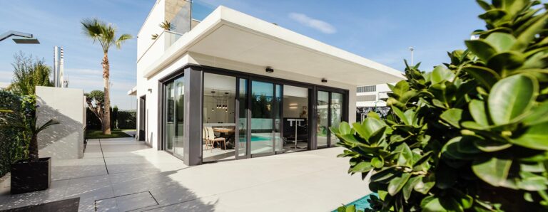 A long shot of the house with outdoor pool