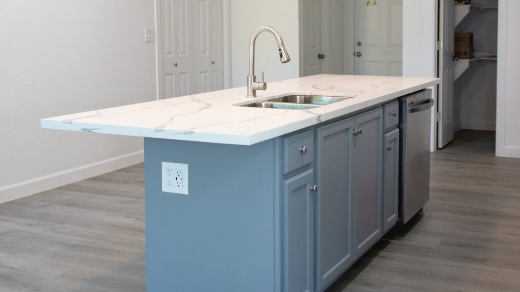 A hand wash basin inside a house with a tap