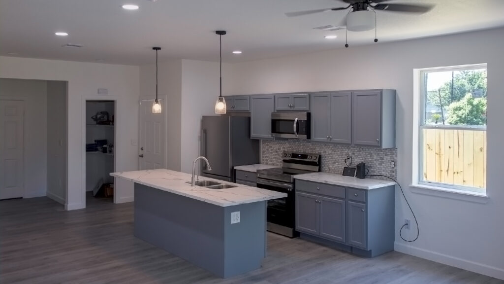 Inside view of a kitchen with some equipments and lights